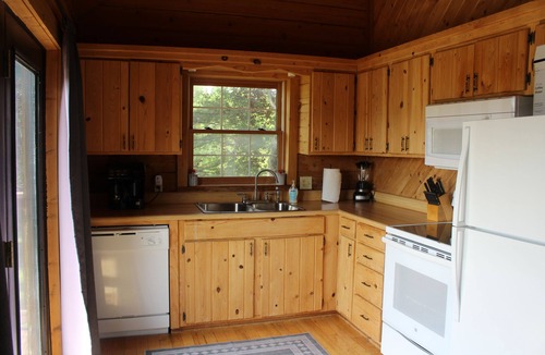 Lee's Summit Cabin | Rustic Log Cabin Escape: Minutes from Wedding Venues & KC Metro!