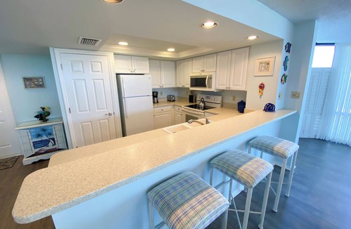Punta Rassa Condo | Sanibel Harbour Resort: Bay View Tower 137 Waterfront condo with private beach
