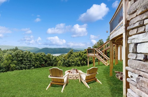 Maynardville House | Scenic lakeview retreat with wraparound deck, vaulted ceilings & game room