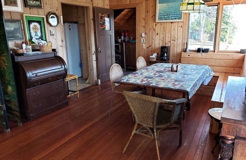 Onekama House | Secluded Home w/private Portage Lk dock & beach next to Lk Michigan beach