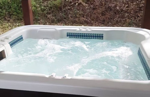Marshall House | Secluded Magnolia Cabin & Hot Tub