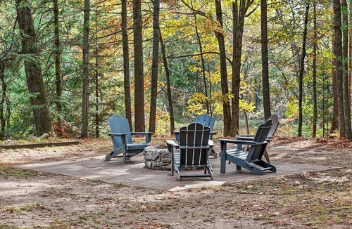 Evart Cabin | Secluded Riverfront Cottage | Sauna, Fire & Kayaks