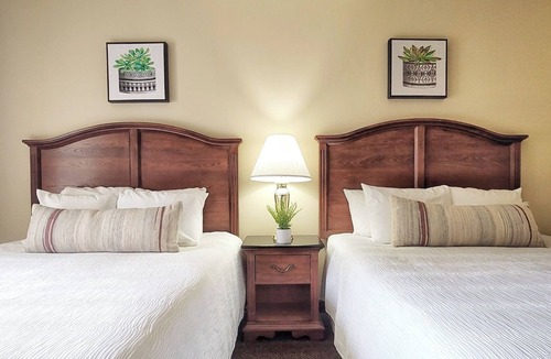 Pembine Hotel | Serene Island Retreat w/Scenic River View! Outdoor Pool, Gym, & Free Parking!