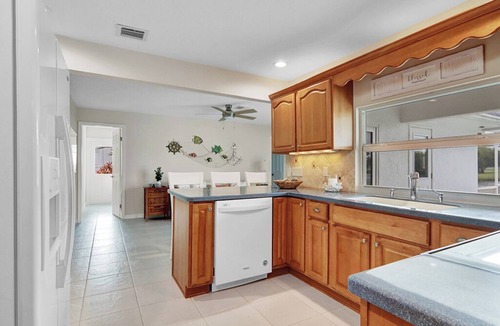 Jensen Beach House | Serene LAKE House 3br Heated POOL Home - near the beach and quiet!