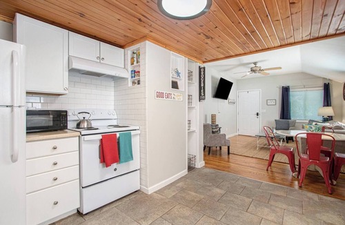 Paw Paw Lake House | Short Description: Lakewood Bungalow | Screened Porch 2 Baths Basement Hangout Walk to Lake Onsite Laundry