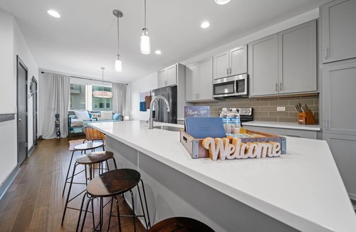 Katie Hill Neighborhood Condo | Skyline Vibes