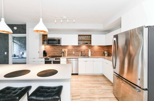 Crystal City Apartment | Sleek 2BR Residence with Gym, Parking & Rooftop Deck