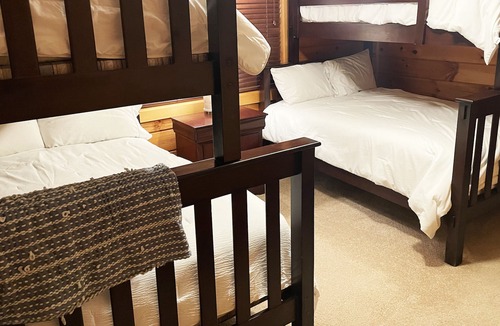 Houston House | Smith Lake Getaway: Lake front, custom log home with private dock and swim deck.
