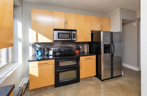 Court Avenue Entertainment District Condo | Spacious 2BR 2BA with Parking, Gorgeous Skyline View, and Direct Skywalk Access!