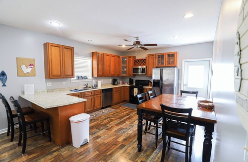 Gilbertsville House | Spacious Home in Moors Community on KY Lake with Outdoor Hot Tub and Fire Pit