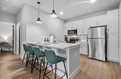Rogers Apartment | Spacious King Suite Near AMP, Bike Lift & Walmart HQ
