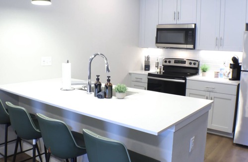 Rogers Apartment | Spacious King Suite Near AMP, Bike Lift & Walmart HQ