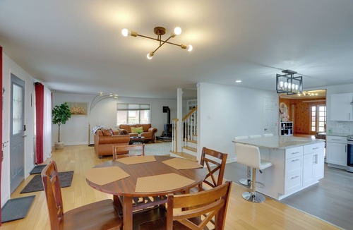 Woodland Beach Cottage | Spacious Lakefront House w/Backyard Fire Pit