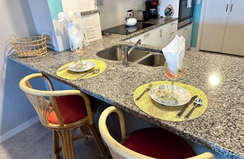 Grove City Condo | Spot manatees from your balcony
