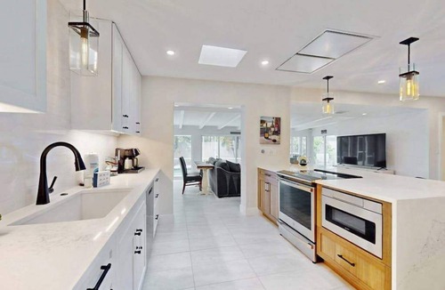 Ringling Estates House | St Armands oasis with saltwater pool - walk to beach & shops