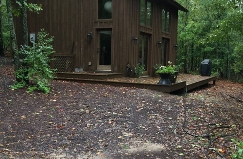 Aiken Cottage | Stunning and private mid-century modern inspired cottage nestled in the woods.