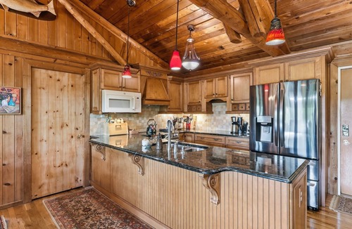 Huddleston House | Stunning Cedar 4 BR , 3 full bath hm with amazing views of the lake & mountains. Private deep water dock with adjacent floating dock. Located in the largest NO Wake Cove on the lake, perfect for swimming and kayaking/paddle boarding.