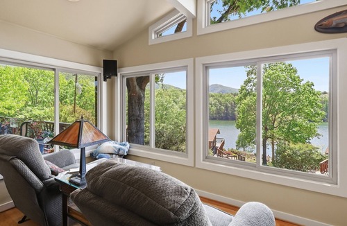 Huddleston House | Stunning Cedar 4 BR , 3 full bath hm with amazing views of the lake & mountains. Private deep water dock with adjacent floating dock. Located in the largest NO Wake Cove on the lake, perfect for swimming and kayaking/paddle boarding.