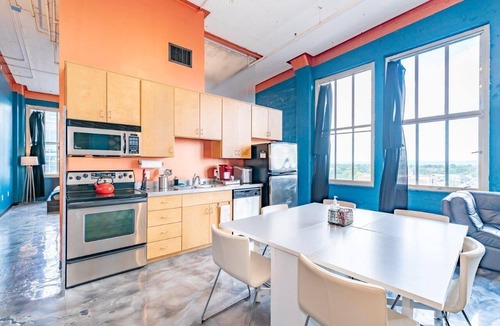 West Main Historic District Condo | Stunning Downtown Louisville Top Floor Corner Loft with Views
