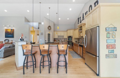 Clarklake House | Stunning lake access home, steps from Clarklake with dock slip and marina access