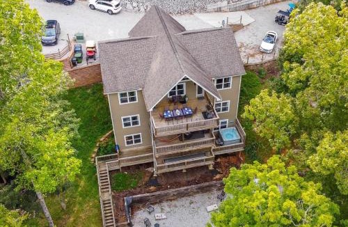 Lakeside Estates House | Stunning Lakeview Home Game Room Dock Hot Tub