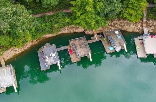 Lakeside Estates House | Stunning Lakeview Home Game Room Dock Hot Tub