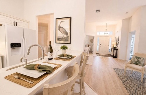 Pebble Beach House | Stunning Newer Waterfront 3bd/2ba Home, Heated Pool, Gulf Beaches, Pet Friendly!