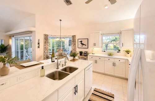 Pebble Beach House | Stunning Newer Waterfront 3bd/2ba Home, Heated Pool, Gulf Beaches, Pet Friendly!