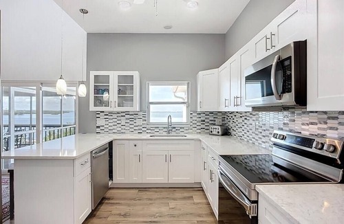 Bayshore Gardens House | Summer Price Break!Waterfront Retreat 6BD-5BA Bring your Boat!