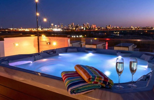 Katie Hill Neighborhood House | Summer rooftop decks, hot tub, speakeasy lounge near Nissan Stadium