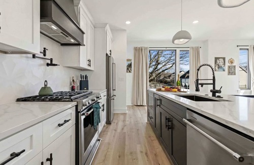 Hurwood Heights House | Summer rooftop hot tub, game room, sauna, near Broadway & Geodis Park
