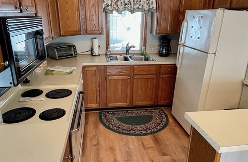 Cadillac Cottage | Sunrise Shores cottage on the beautiful Lake Mitchell