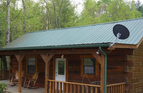 Tellico Plains Cabin | Tellico Cabins, Cowboy cabin with hot tub.