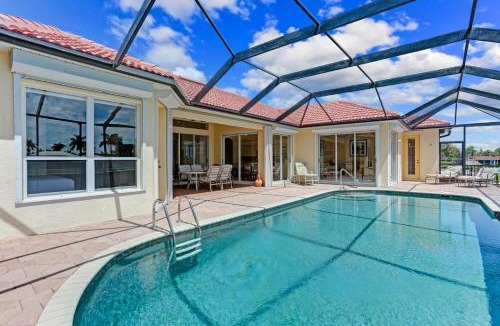 Yacht Club Villa | The Hammock - Beautiful waterfront 4 bedroom home with heated pool