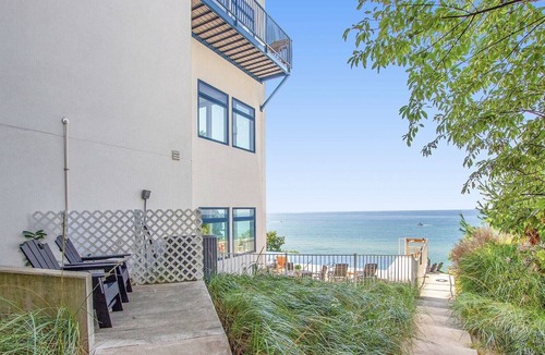 Holland House | The Only Property Offering Infinity Pool and Spa Overlooking Lake Michigan.