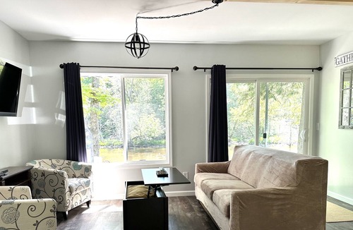 Suring Cottage | The Rivers Edge Cottage! ATV-UTV-Snowmobiling right out your front door!