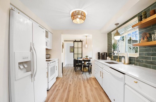 Mason House | The Sleepy Tiki - Game room, Tiki lounge, Fire pit, Fenced yard – Pet friendly!