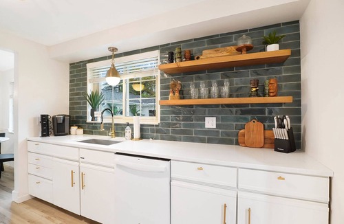 Mason House | The Sleepy Tiki - Game room, Tiki lounge, Fire pit, Fenced yard – Pet friendly!