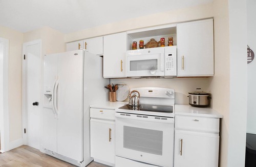 Mason House | The Sleepy Tiki - Game room, Tiki lounge, Fire pit, Fenced yard – Pet friendly!