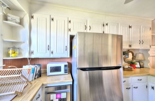 Greer House | This urban cottage is walkable to Greer’s dining, shopping, parks and more!