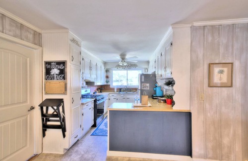 Greer House | This urban cottage is walkable to Greer’s dining, shopping, parks and more!