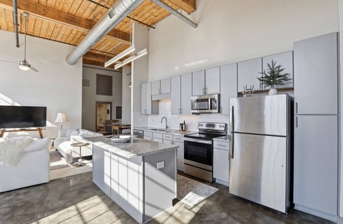 Converse Apartment | Top Floor River View, Historic Mill Loft, Sleeps 6