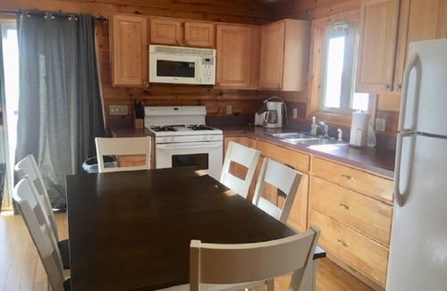 Mayfield House | Traverse City close to downtown Waterfront Spider Lake, On-site Rentals, Pets ok