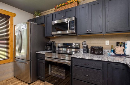 Gatlinburg Ski Chalet | Tri Star Lodge - Luxurious 4BR Chalet w/Indoor Pool, Theater & Game Room