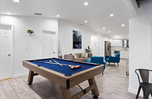 South Corals House | Tropical Oasis RetreatI Luxe Pool + Arcade Getaway