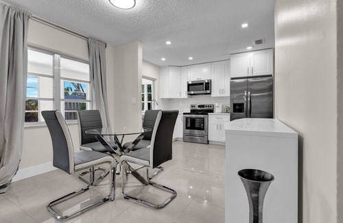 Tamarac House | Tropical Poolside Retreat in Tamarac - Lots of Activities!