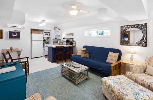 Folly Beach Apartment | TUCKED AWAY. 1/2 block from shops, restaurants and bars.1block to beach.