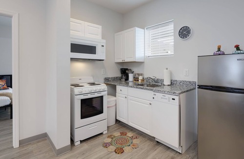 East Nashville Condo | TWO Condos! Side by Side Curated Suites! Sleeps 18! Parking!