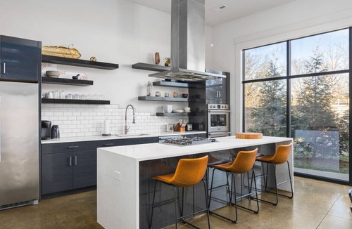 Urbandale Nations House | Unique Modern Ranch with Pool, Hot Tub, Grill & Fireplace