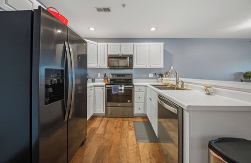 Kaiser Condo | Updated Lakefront Condo 2/2, Amazing Views, Location, Pool, Waterfront Patio!